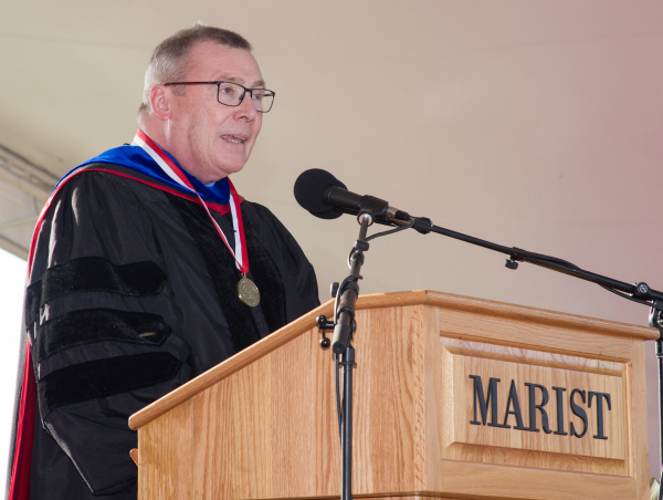 Image of Marist Trustee and Scholar-In-Residence Brother Sean Sammon speaking at the commencement ceremony.