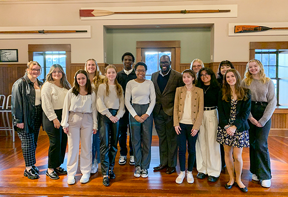 Image of Jamelle Bouie with students in Cornell Boathouse.