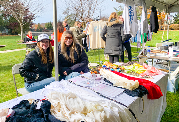 Image of workers at Fashion Fall Fest.