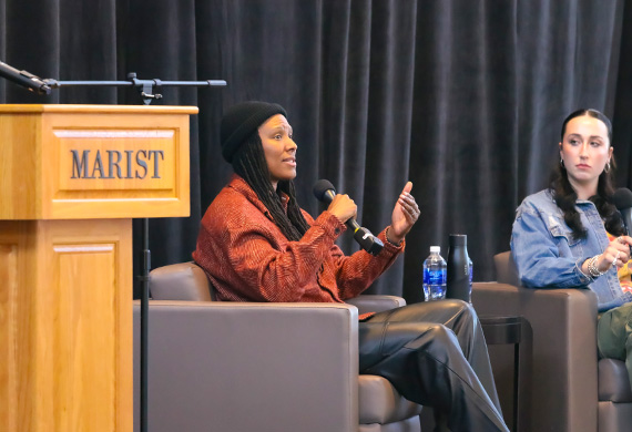 Image of Chamique Holdsclaw speaking at Marist.