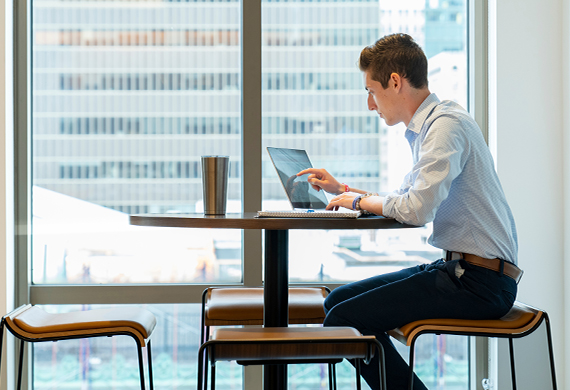 Image of student working on laptop.