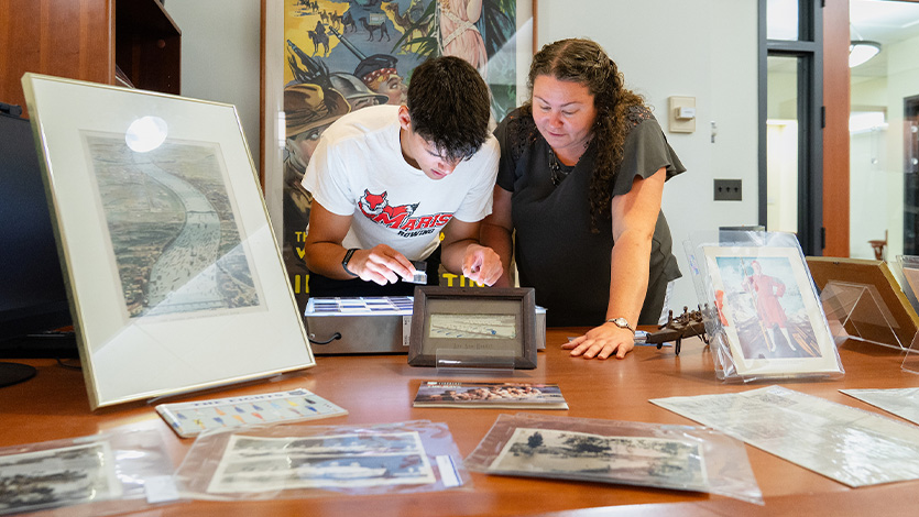 Image of Elizabeth Clarke and Julius Stratton working in the archives.