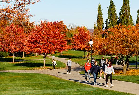 Image of Marist University students walking campus in the Fall.