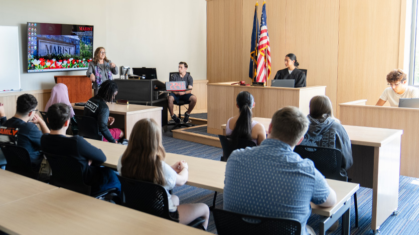 Image of a class in the Jerome and Tina Pickett Mock Courtroom at the Dyson Center.