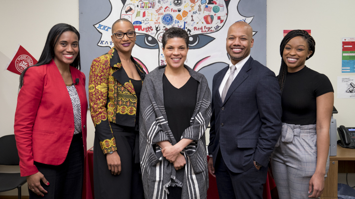 Image of Michelle Alexander with Marist faculty