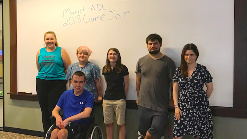 Dr. Karen Schrier (right) with students during a game jam.