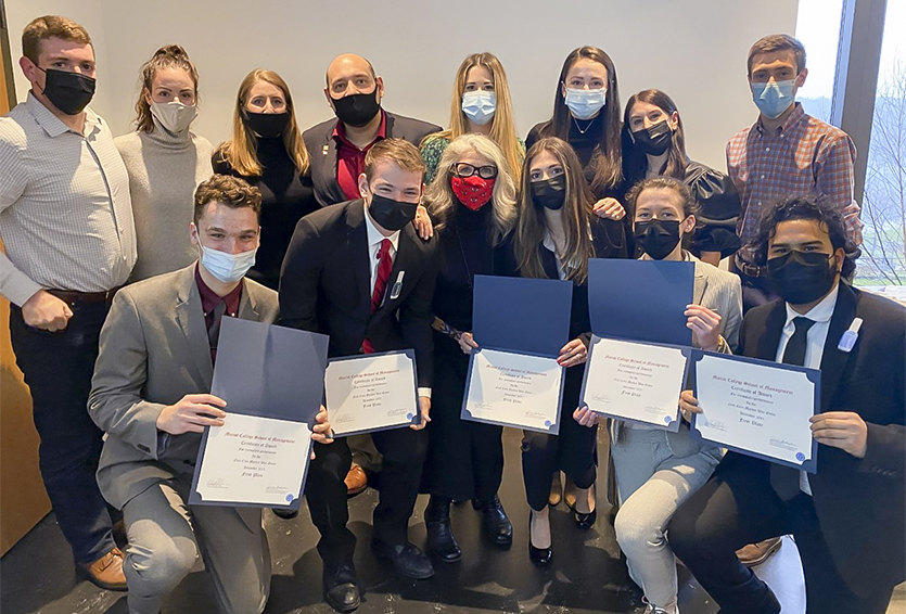Dr. Helen Rothberg (front row, center), the winning team and other participants in the fall 2021 war game competition. The game focused on issues in the cosmetics industry.
