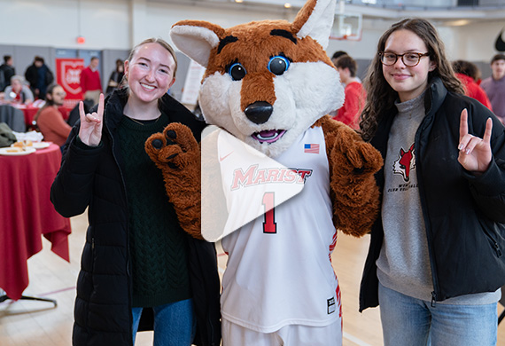 Image of Frankie with students at the UNIVersary celebration with 