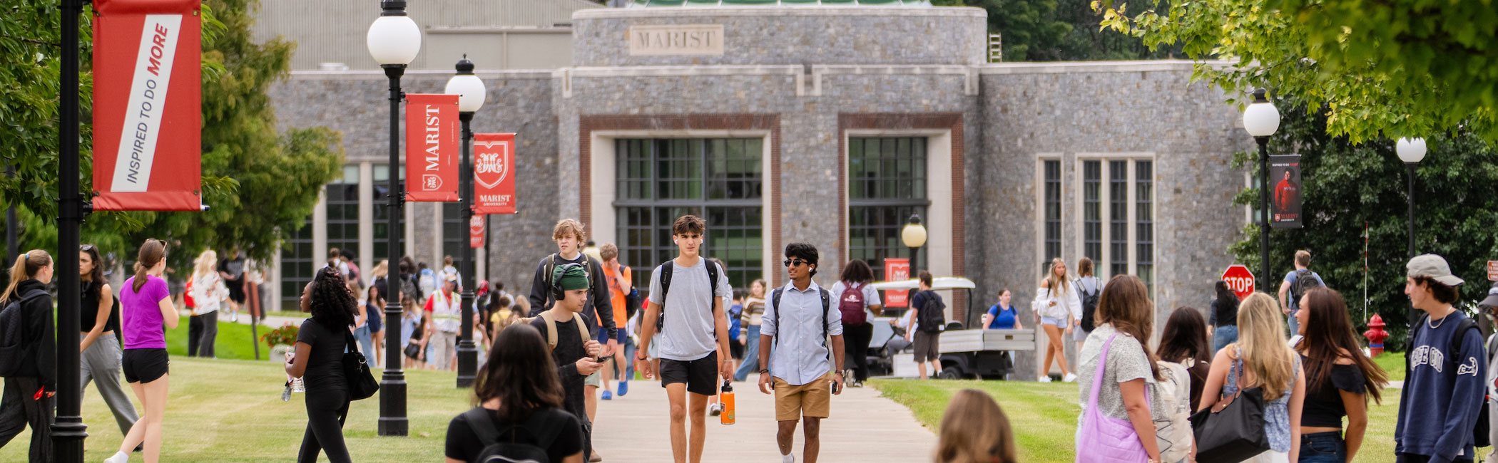 Image of a Marist University beauty shot of the rotunda with students in the foreground.