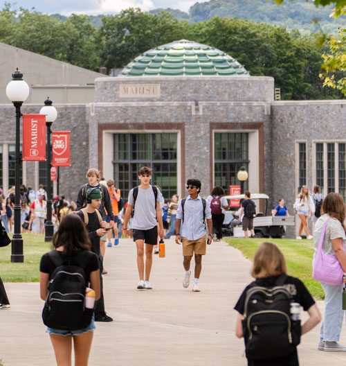 Image of a Marist University beauty shot of the rotunda with students in the foreground.