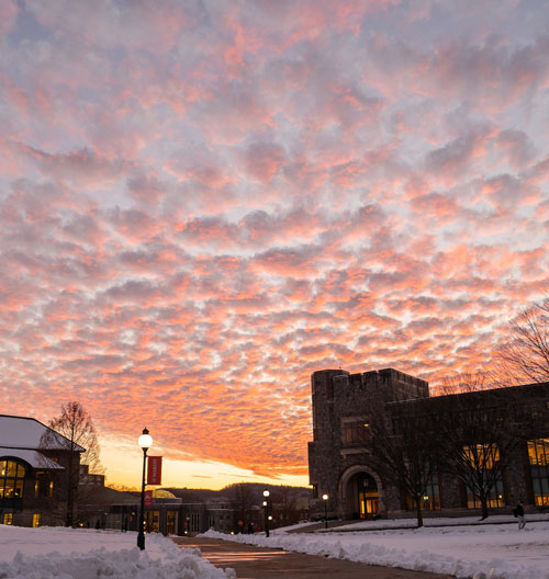 Image of the Marist University campus at sunset in winter.