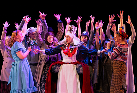Image of the cast of Alice by Heart performing on stage at Marist University.