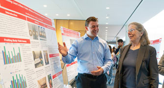 Image of Marist University student presenting academic research.