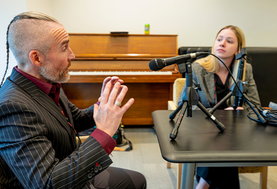 Image of Marist University's Sentricus Podcast in production and recording.