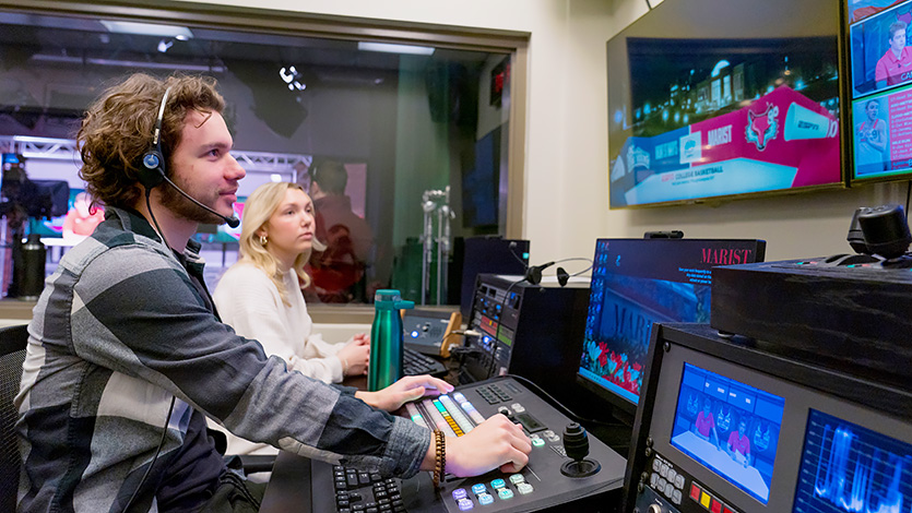 Image of student working behind the scenes for the Red Fox Report.
