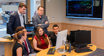 Marist University Summer Pre-College Finance students in the Investment Center.