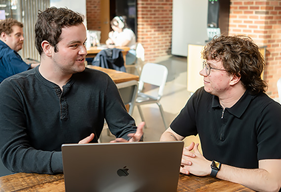 Gavin Gilooly ’26 (left) and Parker Alber (right) meeting in Steel Plant. Photo by Nelson Echeverria/Marist University. 