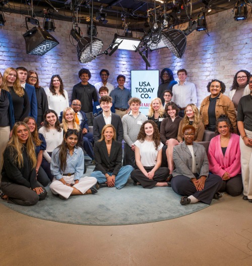 Image of students with Lark-Marie Anton in the USA TODAY studio.