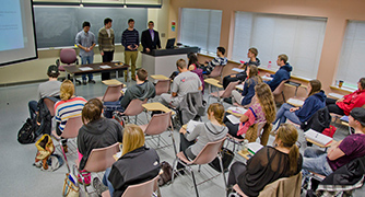 A group of students getting a lecture