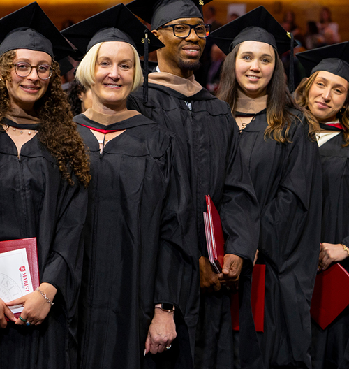 Students lined up in regalia for commencement