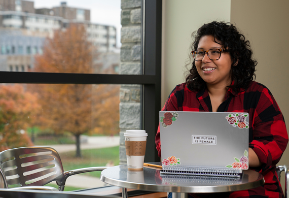 An image of a student on their laptop.