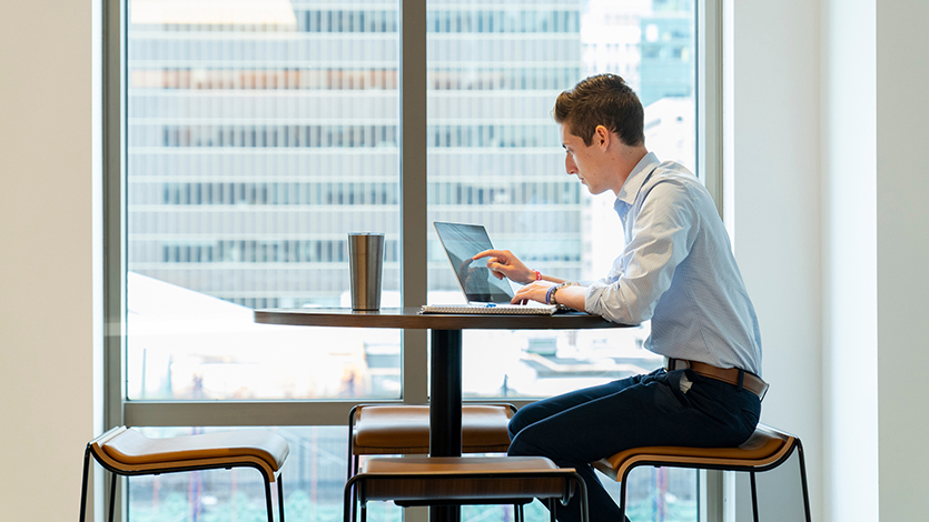 Image of student working on a laptop.