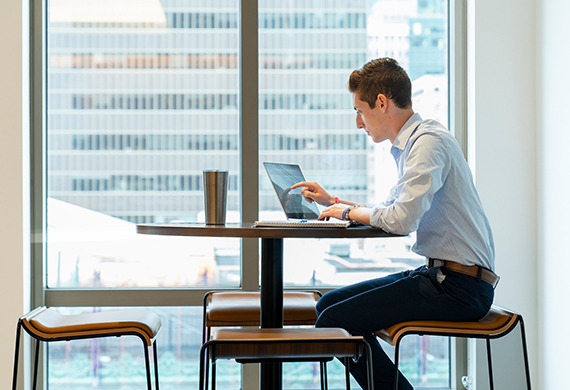 Image of student working on a laptop.