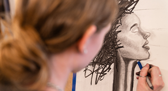image of a student drawing