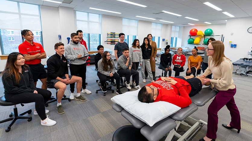 Image of students working in the Doctor of Physical Therapy Lab at the Science and Allied Health Building.