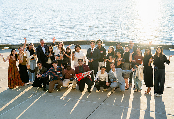 Image of Davis UWC Scholars with President Weinman at the Marist riverfront.