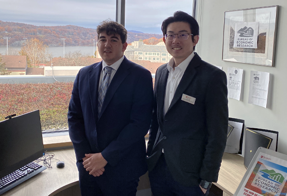 Image of Marist University's Jin Lau with a student for the Bureau of Economic Research.