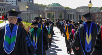 Image of procession entering ceremony site.