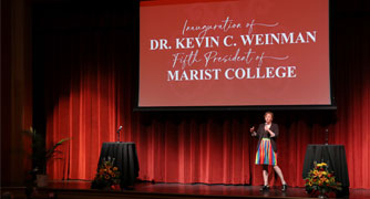 Image of faculty giving snap talk during presidential inauguration