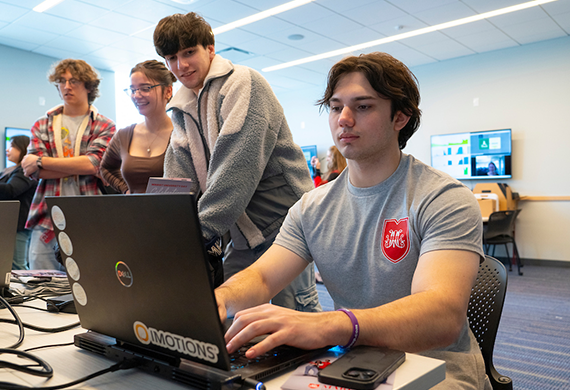 Image of Marist student working on a lap top.