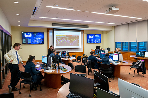 Photo of students and faculty in the Investment Center