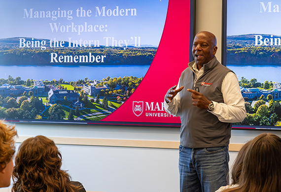 Image of a Marist University professor giving a lecture on 