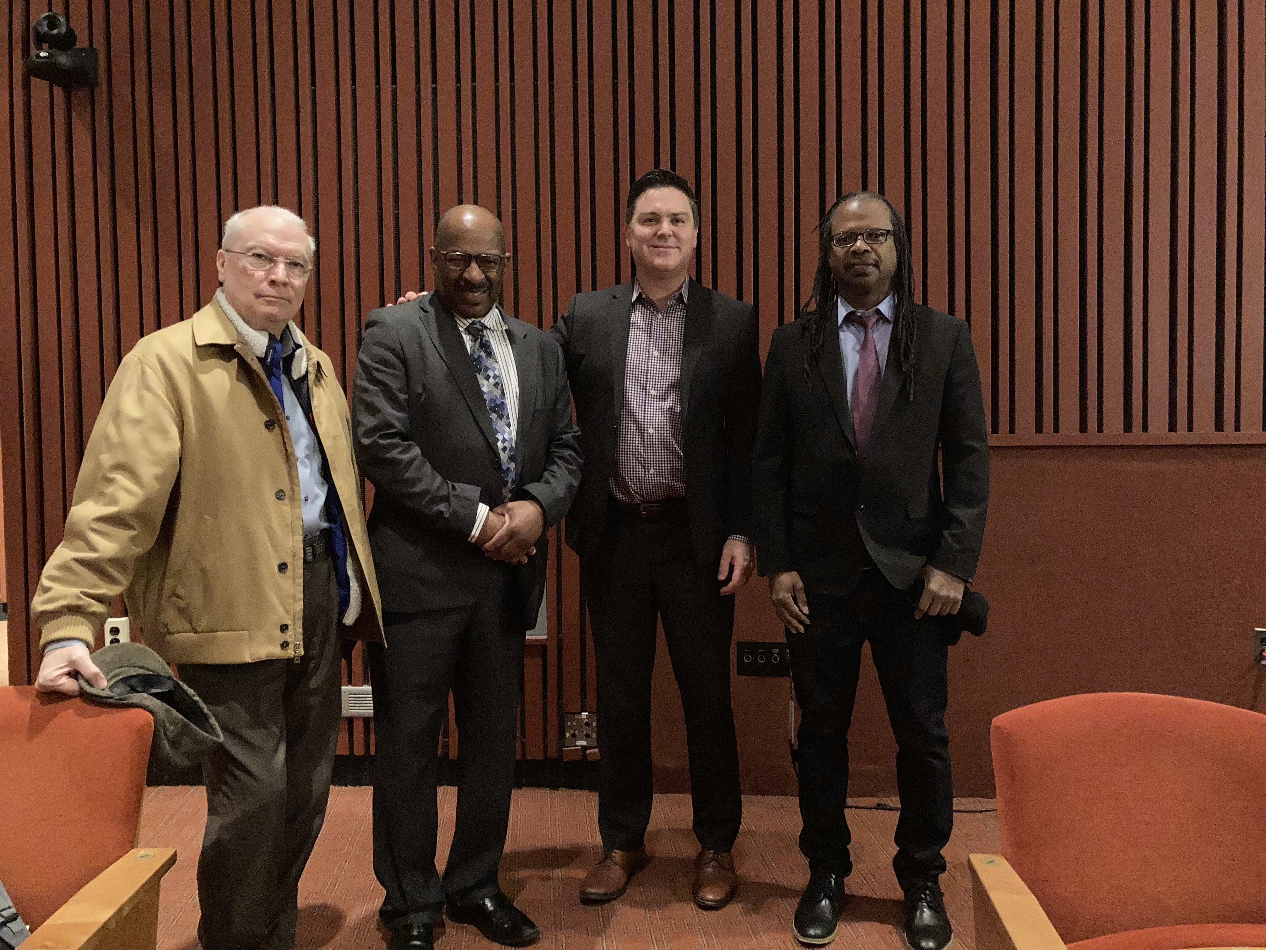 IN THE PHOTO (from left): Prof. Kenneth Sloan, Dr. Timothy Harper, School of Management Interim Dean James Snyder, and Prof. Vernon Murray