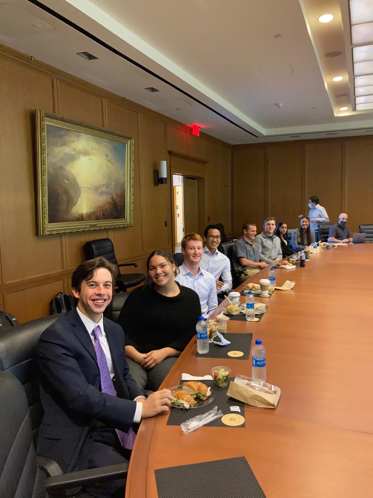 Image of school of management students meeting with Don Reardon.