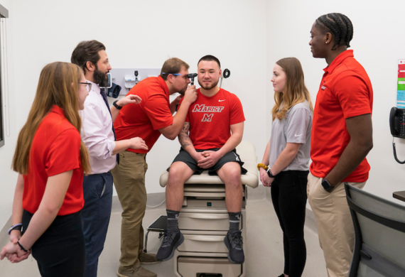 image of Marist MS in Athletic Training students with their professor.