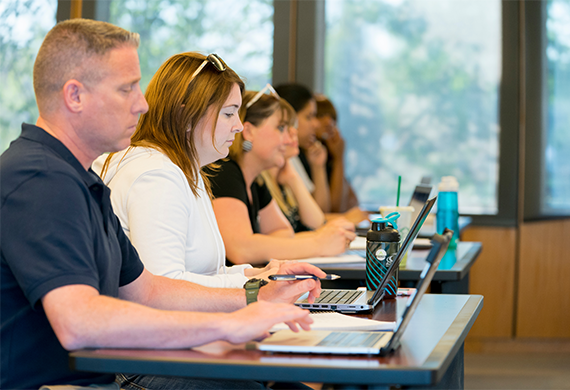 An image of adult students in a classroom.