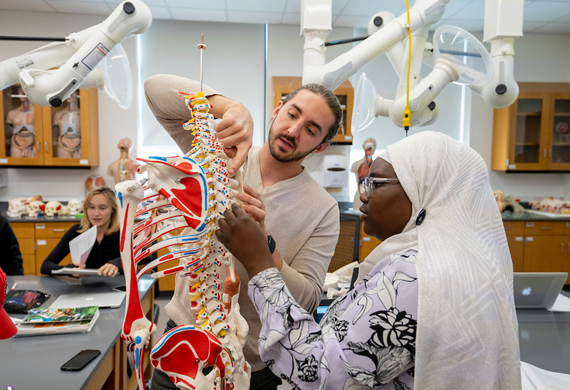 Image of students learning in a biology lab.