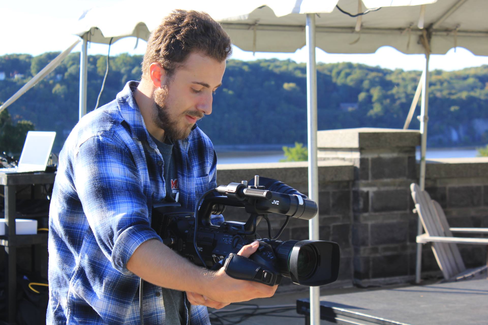 Photo of student with camera