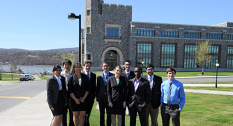 Photo of students on campus in front of building