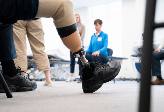 Image of prosthetic limb in a group treatment setting for the doctor of physical therapy degree.