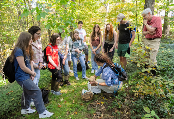 Image of Marist university science students exploring Fern Tor nature preserve.