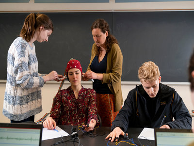 Photo of students in laboratory conducting research