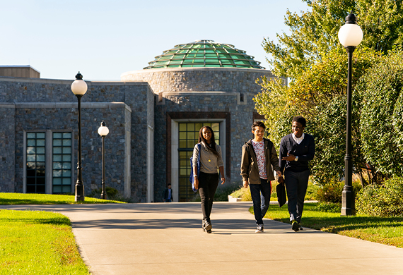 Image of students walking through Marist's riverfront campus.