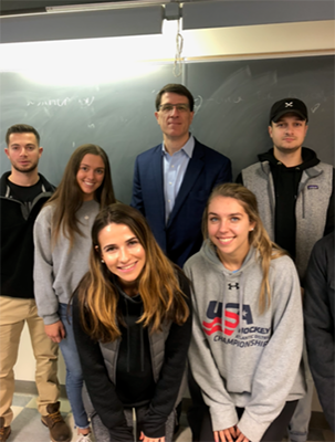 Marist alumnus Christopher M. Capone ’84 and students