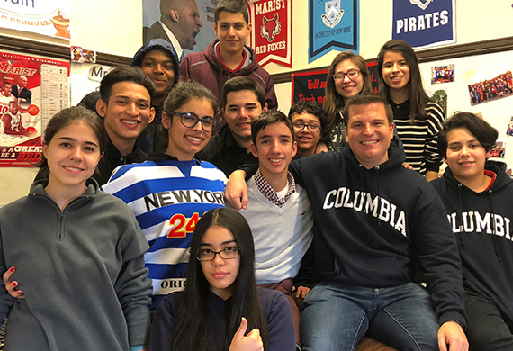 Image of Andrew Paulsen with his class of students