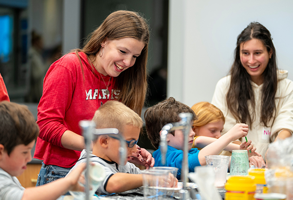 Image of Marist University education majors working with children.